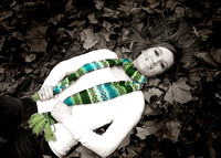 Color Black and White laying in leaves